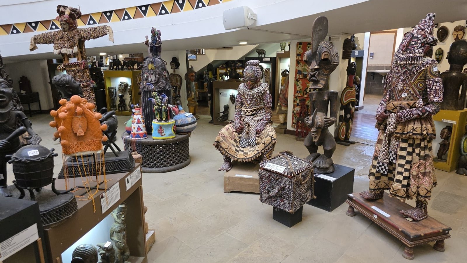 Inside the cultural heritage centre: masks, carved figures and beadwork on display