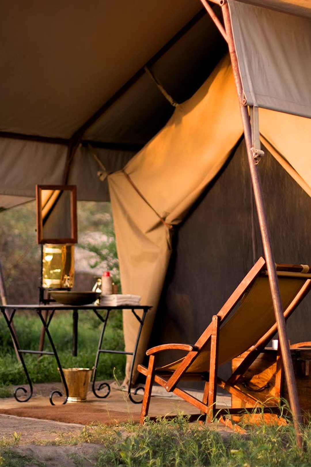 Canvas walls and a lantern at N. Serengeti Under Canvas